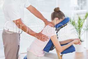 Woman having back massage