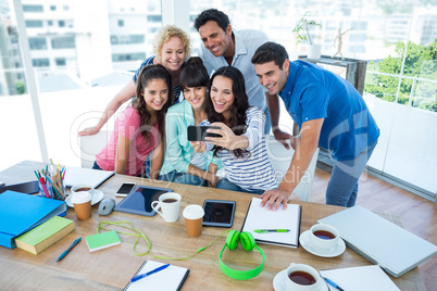 Creative business team taking a selfie