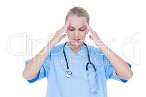 blond female doctor being depressed