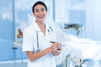 Beautiful smiling doctor smiling at camera