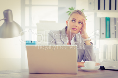 Businesswoman using laptop