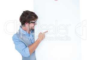 Handsome man holding blank panel