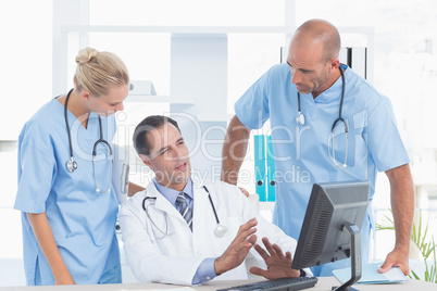 Doctor speaking with his colleague