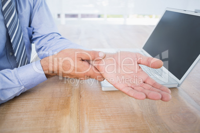 businessman with hand pain