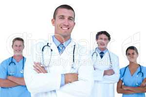 Smiling doctors and nurses standing