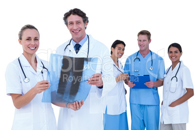 Doctors and nurse standing together