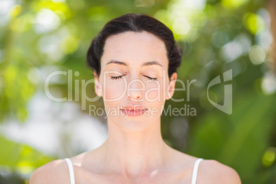 Portrait of a woman in a meditation position