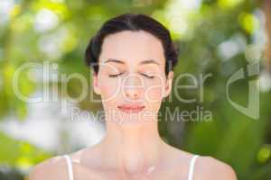 Portrait of a woman in a meditation position