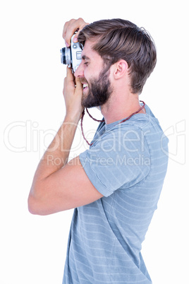 Happy handsome man taking pictures