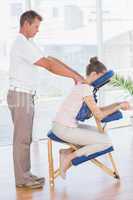 Woman having back massage