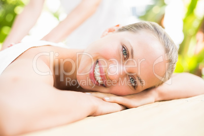 Attractive woman getting massage on her back