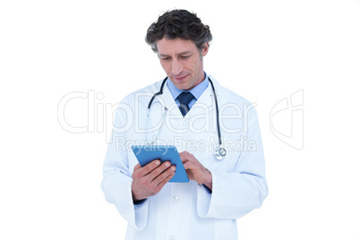 Doctor using his digital tablet