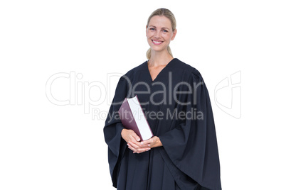 Happy pretty lawyer holding law code