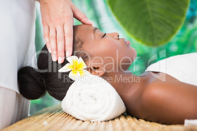 Pretty woman enjoying a head massage