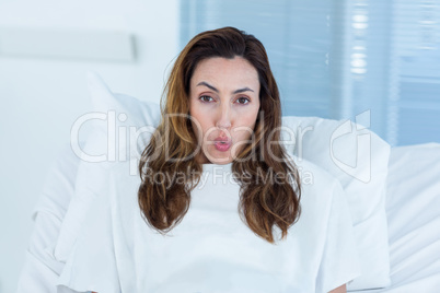 Pregnant woman on a hospital bed