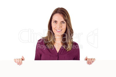 woman holding placeholder in her hands