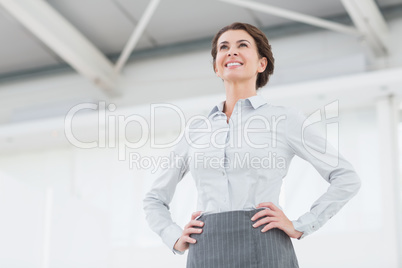 Smiling businesswoman looking away