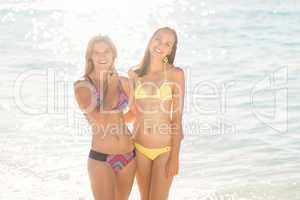 Happy friends having fun in the water together