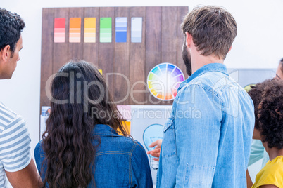 Creative team looking at color sample