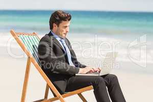 Businessman using his laptop