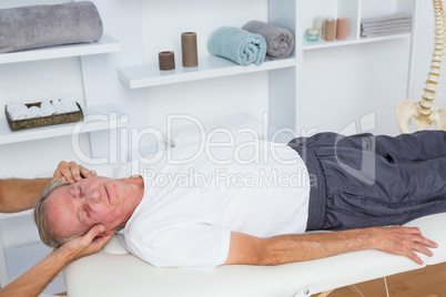 Man receiving head massage