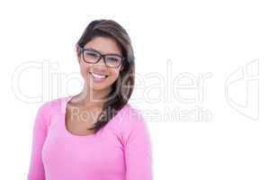 Pretty brunette wearing glasses and smiling at camera
