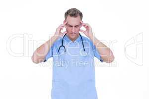 Worried young nurse in blue tunic