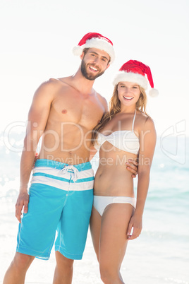 happy couple with Christmas hat