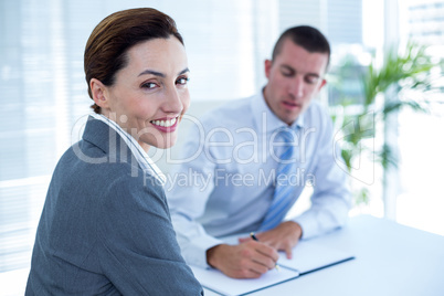 Business people in discussion in an office