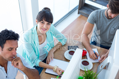 Creative businesswoman smiling at the camera