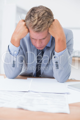 Businessman being depressed by working