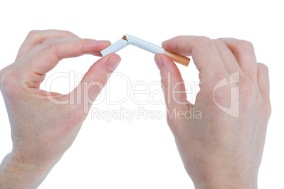 Close up view of woman snapping cigarette