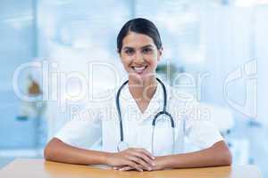 Beautiful smiling doctor looking at camera