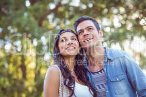 Cute couple smiling in the park