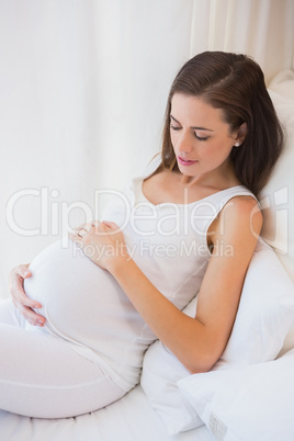 Pregnancy sitting on the sofa