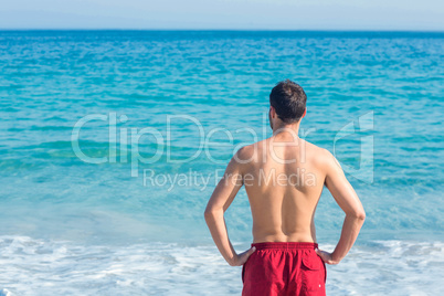 Man looking at the ocean