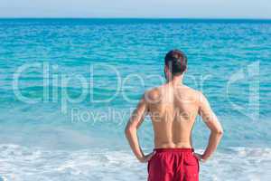 Man looking at the ocean