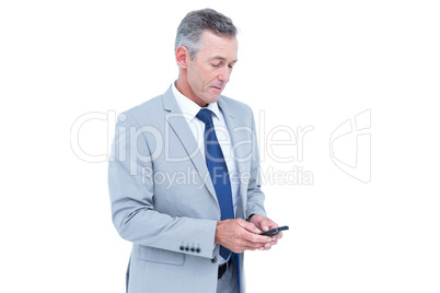 happy businessman playing with his smartphone