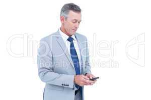 happy businessman playing with his smartphone