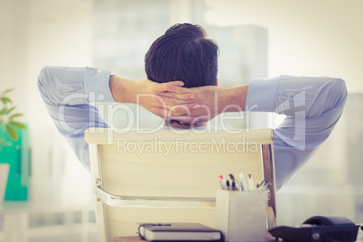 Businessman relaxing in his chair