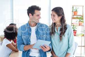 young business people using a tablet