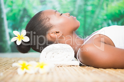 Side view of a beautiful woman on massage table