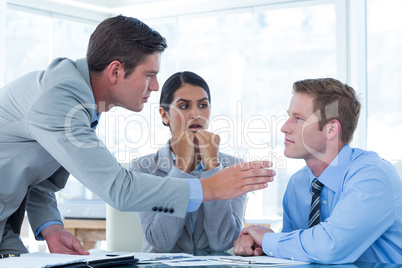 Business people in discussion in an office