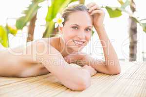 Peaceful blonde lying on massage table