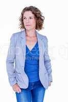 Businesswoman standing with hands in pocket