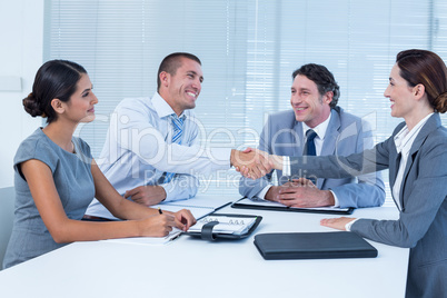 Business team greeting each other