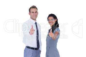 Happy business people looking at camera with thumbs up