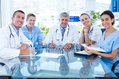 Team of doctors smiling at camera