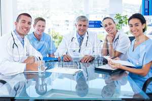 Team of doctors smiling at camera