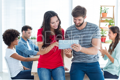 young business people using a tablet